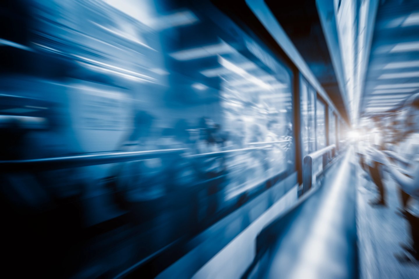 blurred-train-night-leaving-station